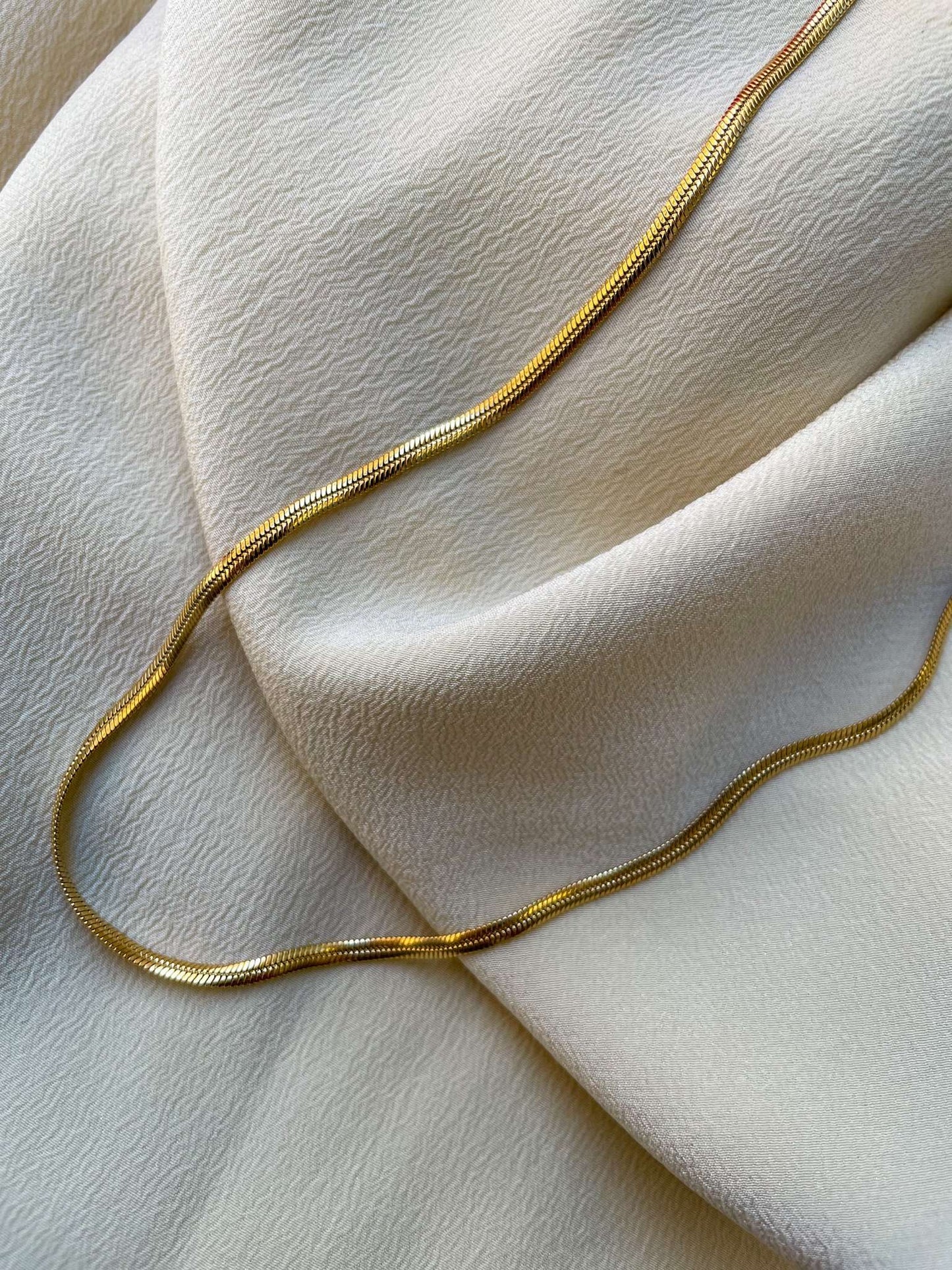 Collana piatta