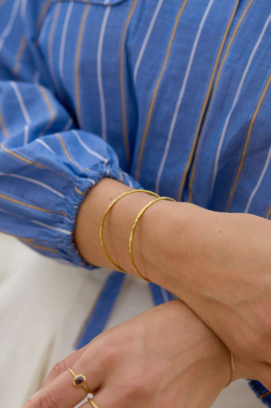 Bracciale rigido in ottone martellato